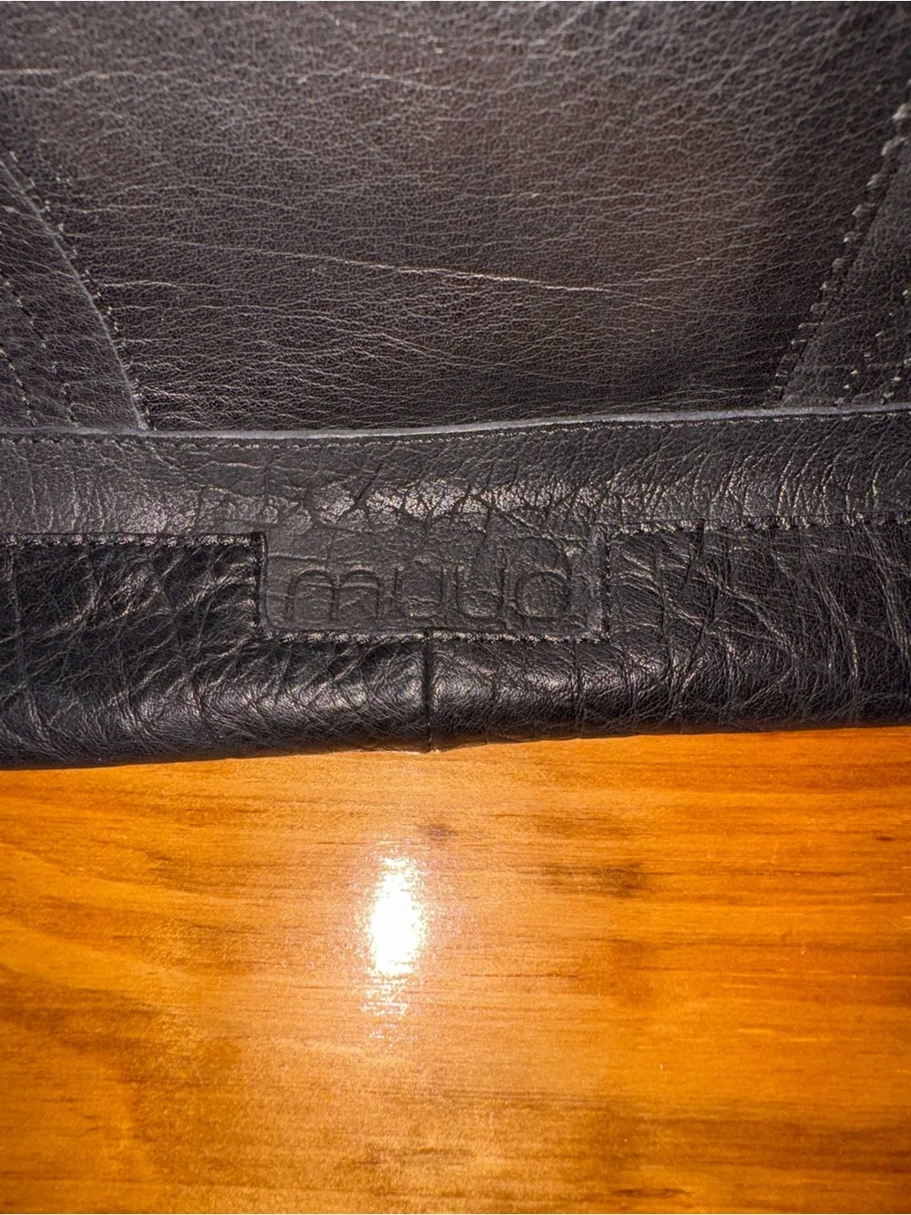 Muud black leather