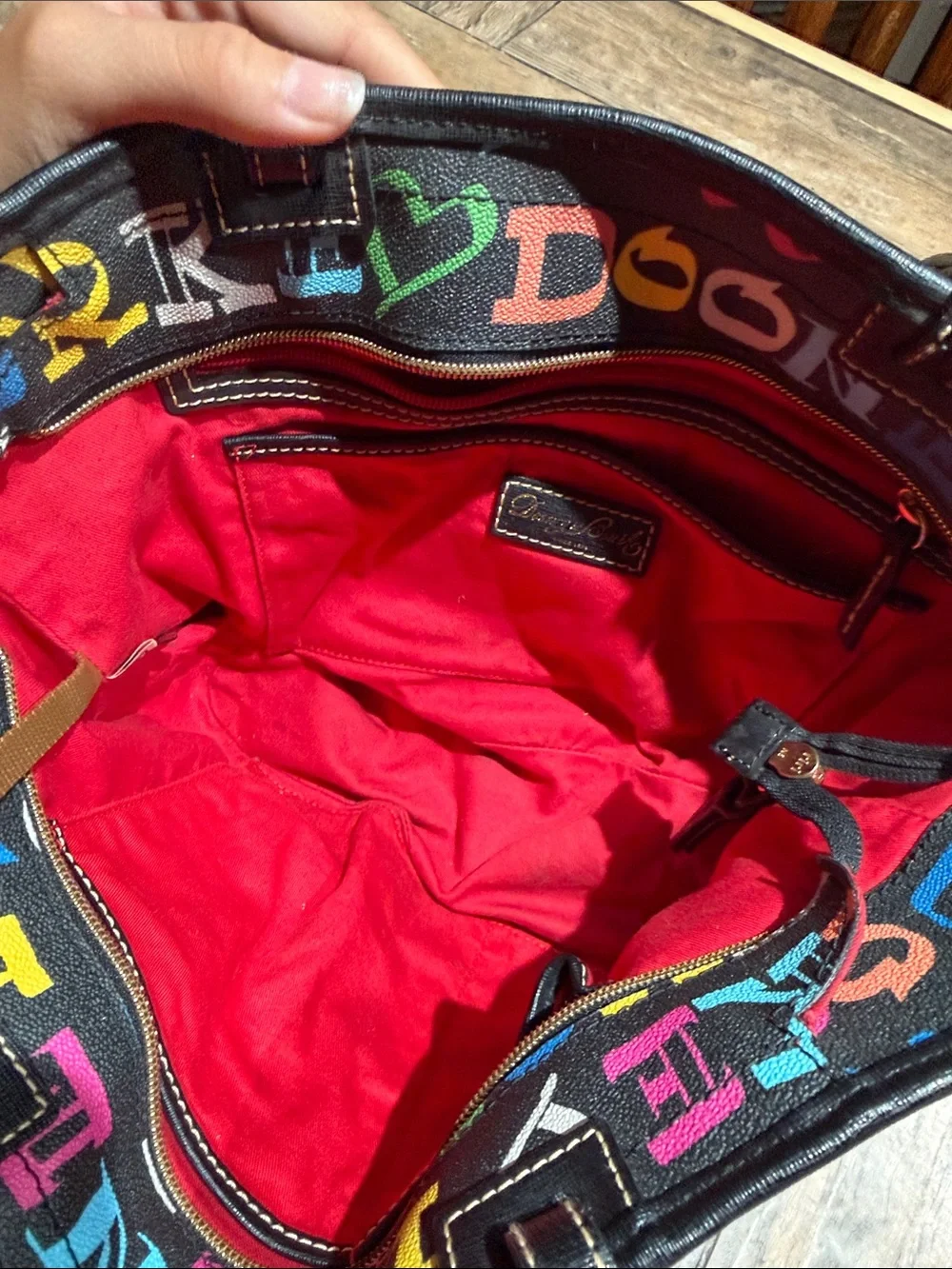 Dooney & Bourke doodle signature