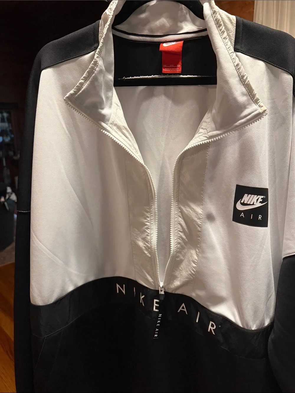 Nike pullover featuring