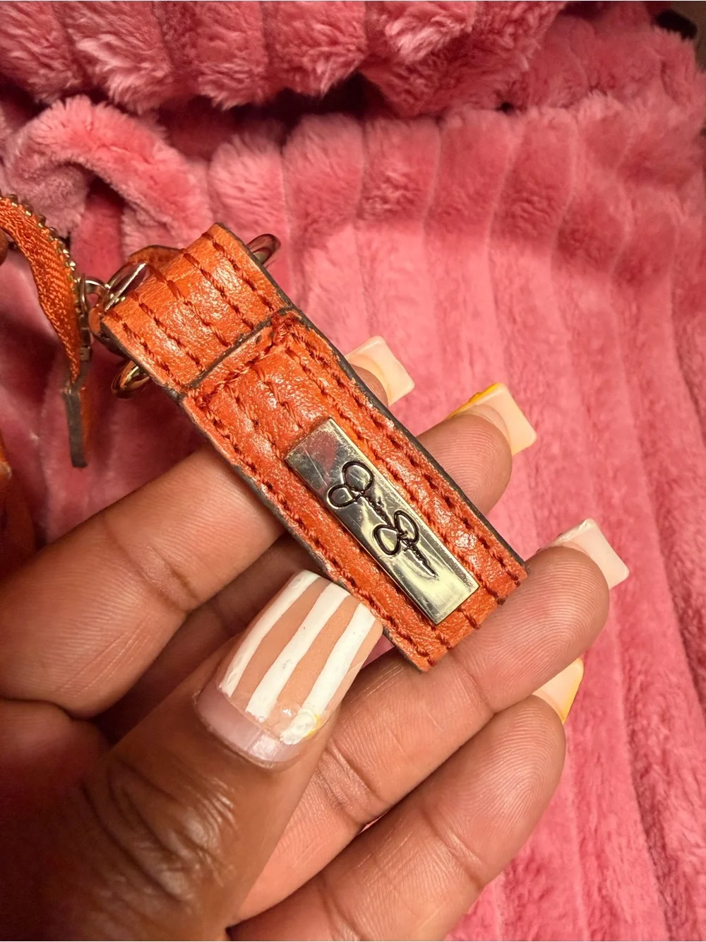 Jessica Simpson stylish orange