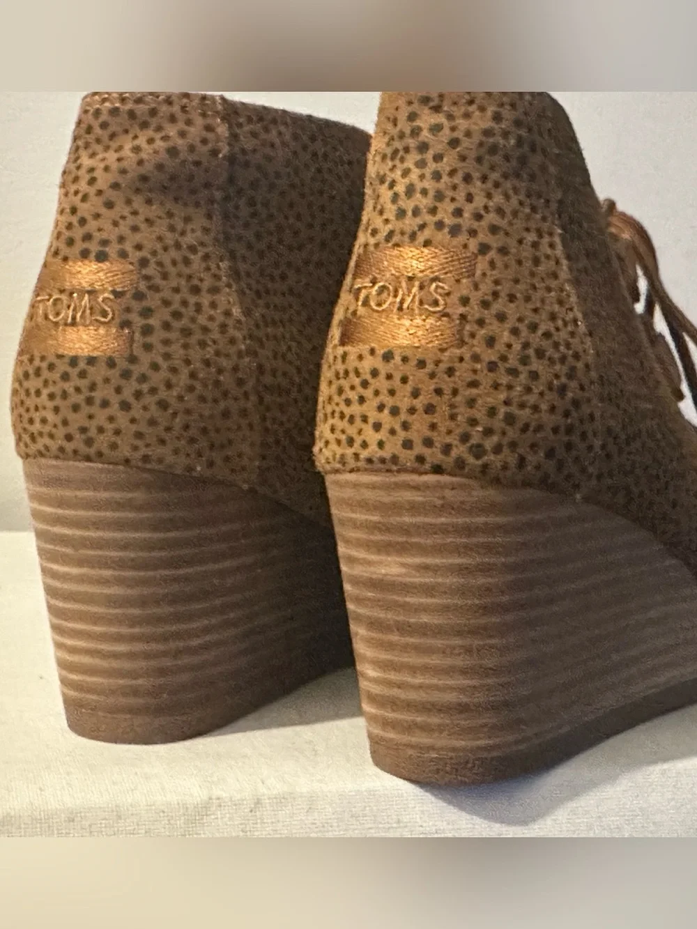 Toms step out