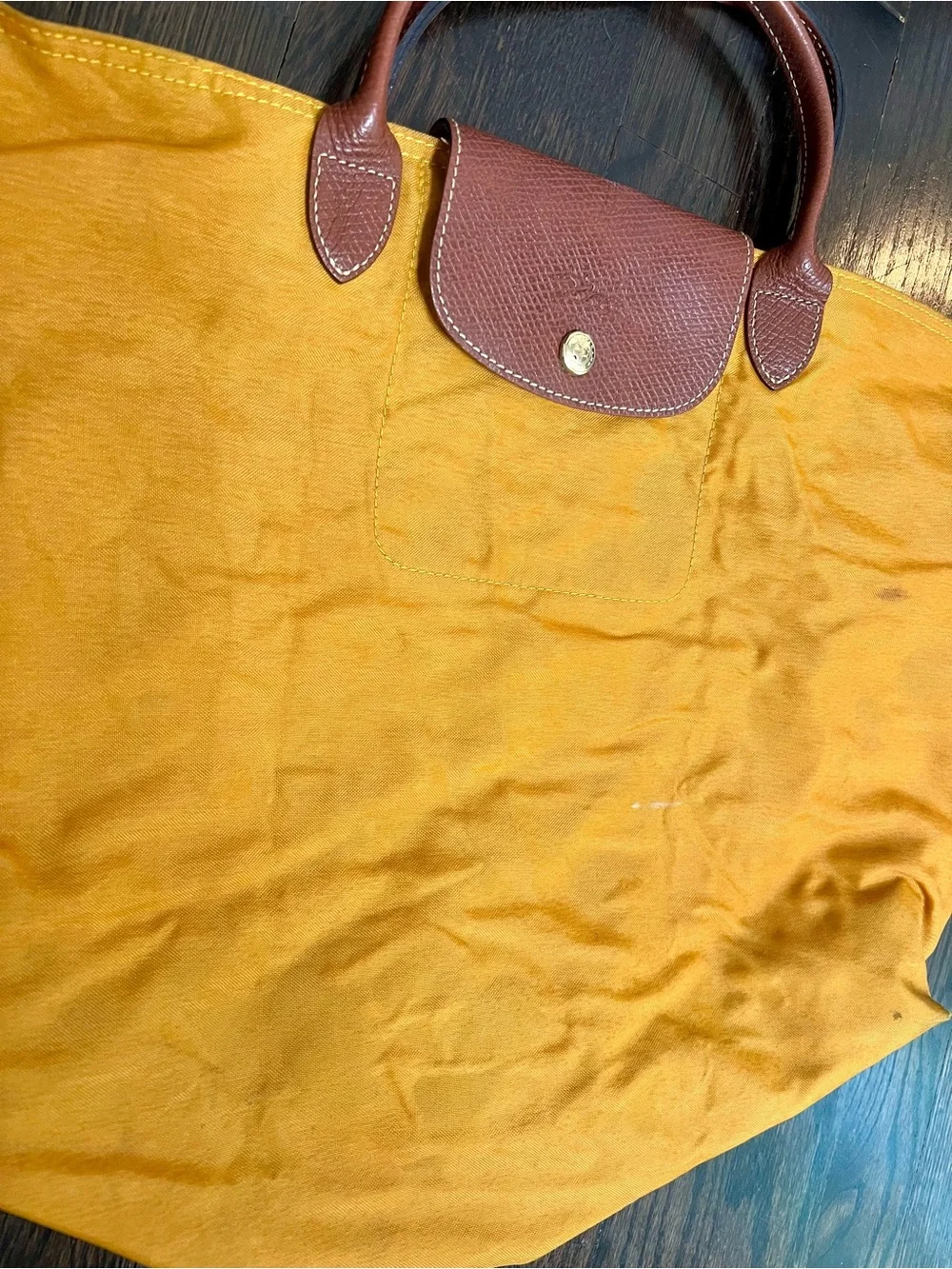 Longchamp rolled creasing minor