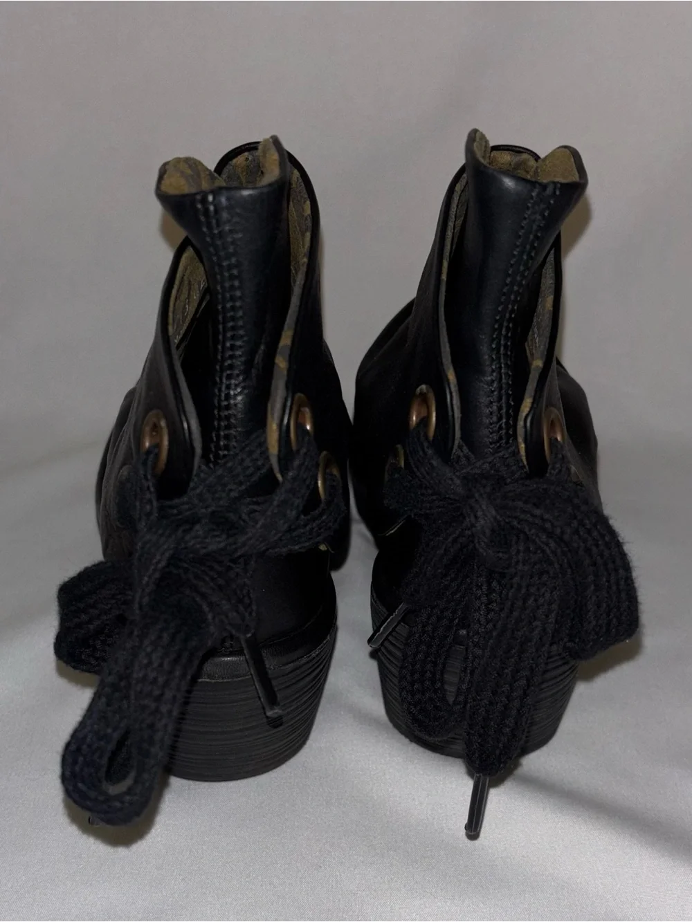Fly London black cushioned upper