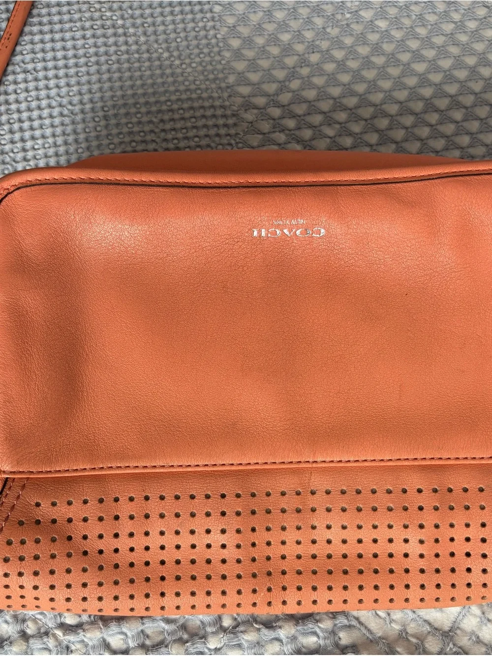 Coach Peach/Coral Perforated Leather Crossbody Bag