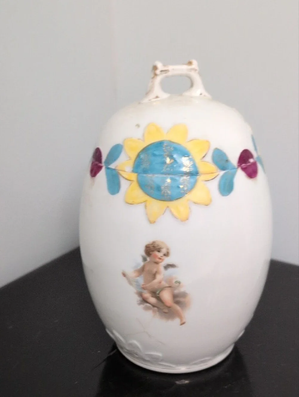 Porcelain Cherub Decorative Jar in White with Yellow & Blue Accents