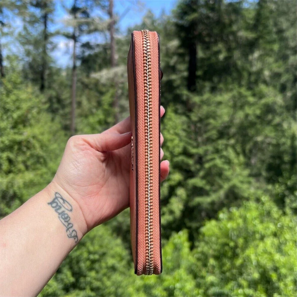 Coach accordion zip