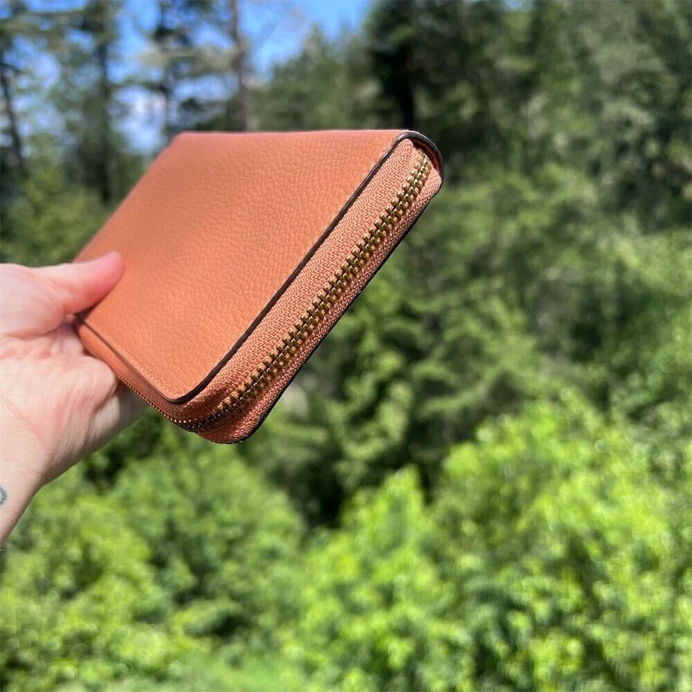 Coach accordion zip