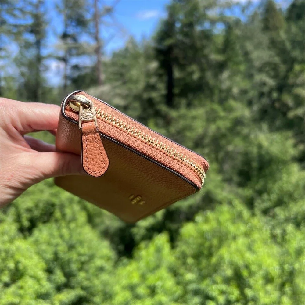 Coach accordion zip