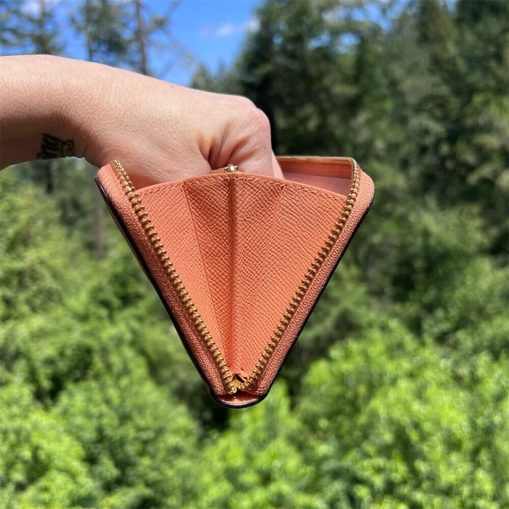Coach accordion zip