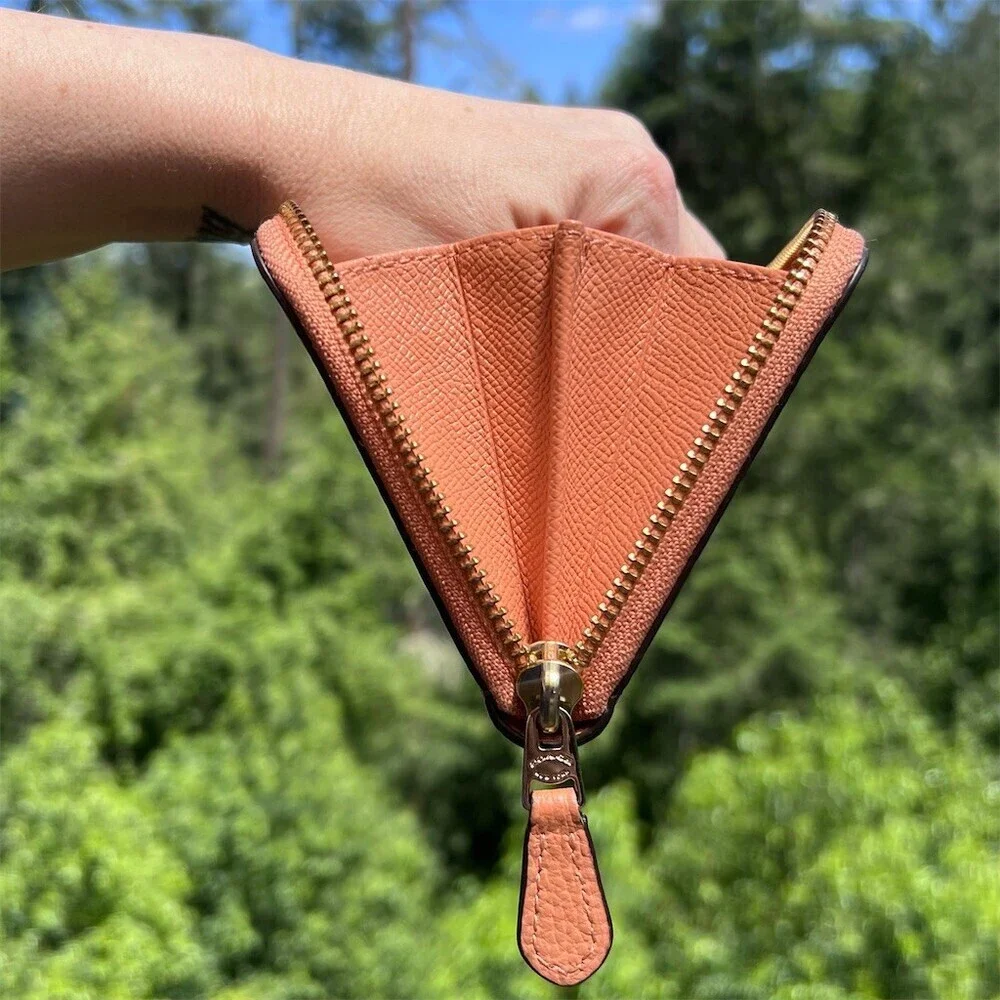 Coach accordion zip