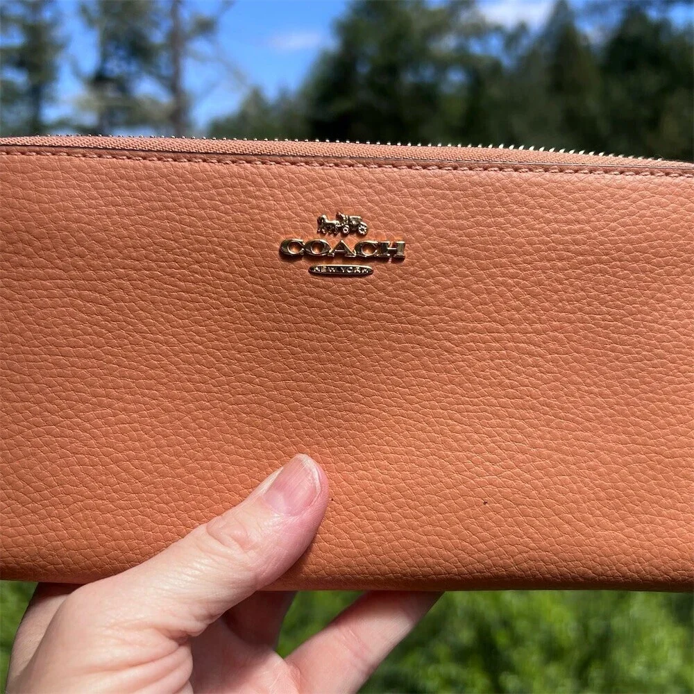 Coach accordion zip