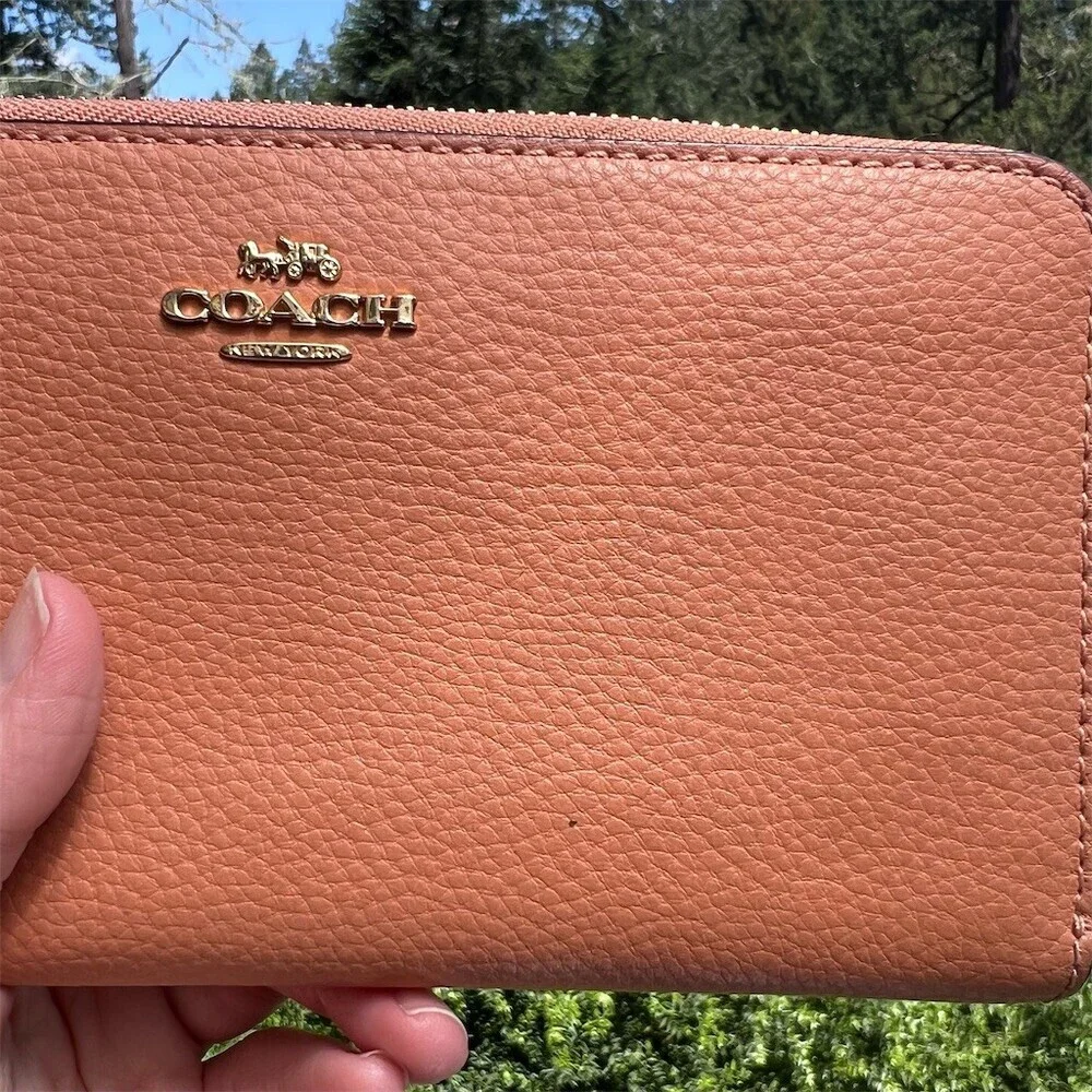 Coach accordion zip