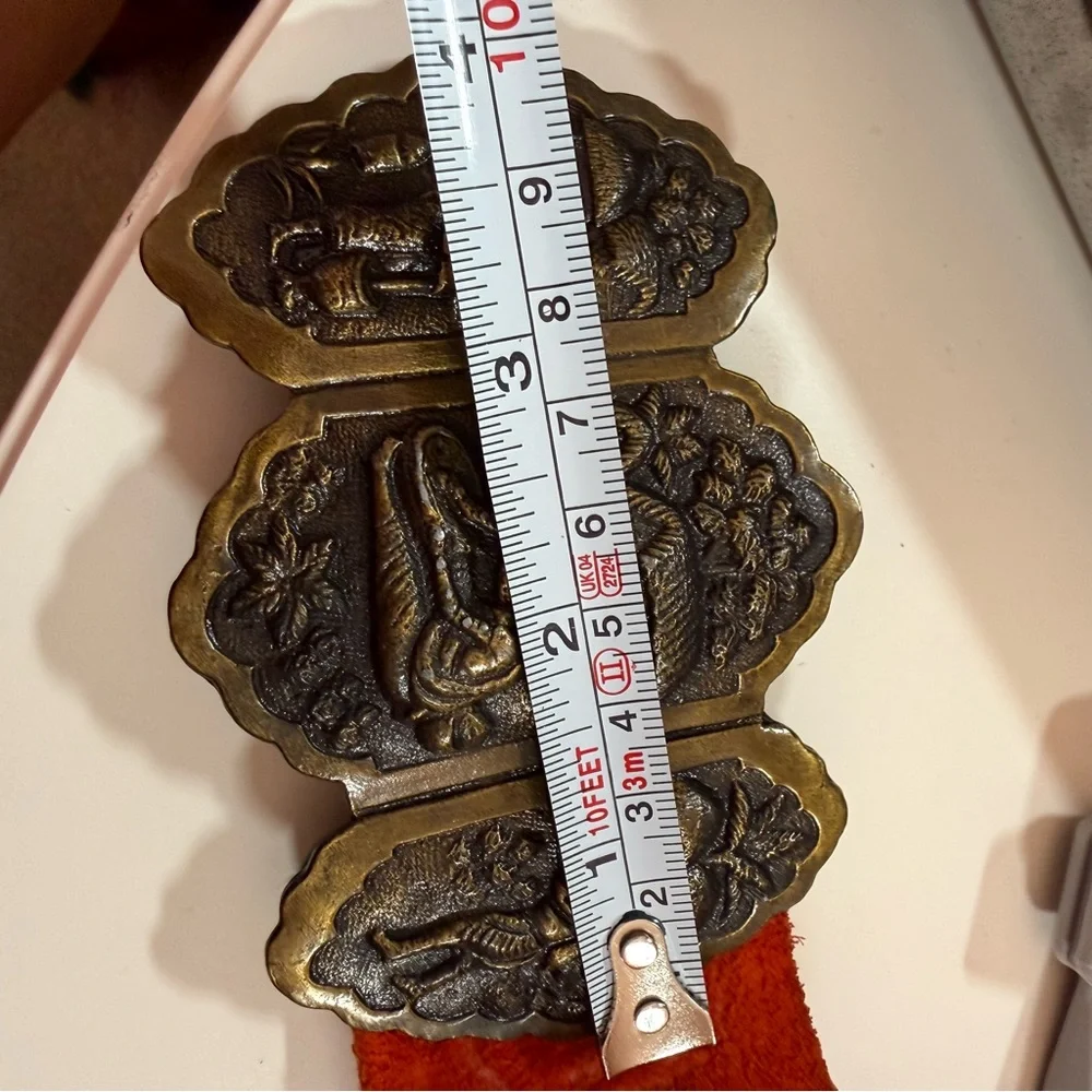 Vintage 1960 70 Boho Exotic Brass buckle Embossed red Leather wide festival Belt