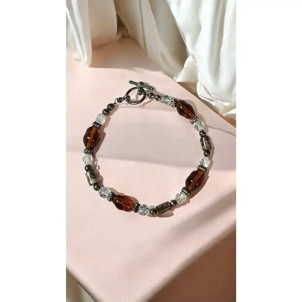 Source Unknown brown crystal