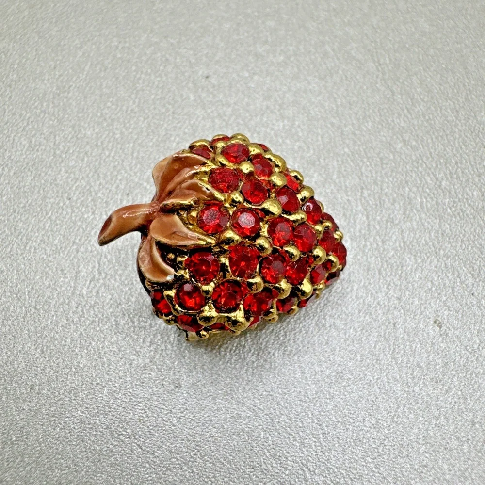 The Unbranded Brand gold pin woman