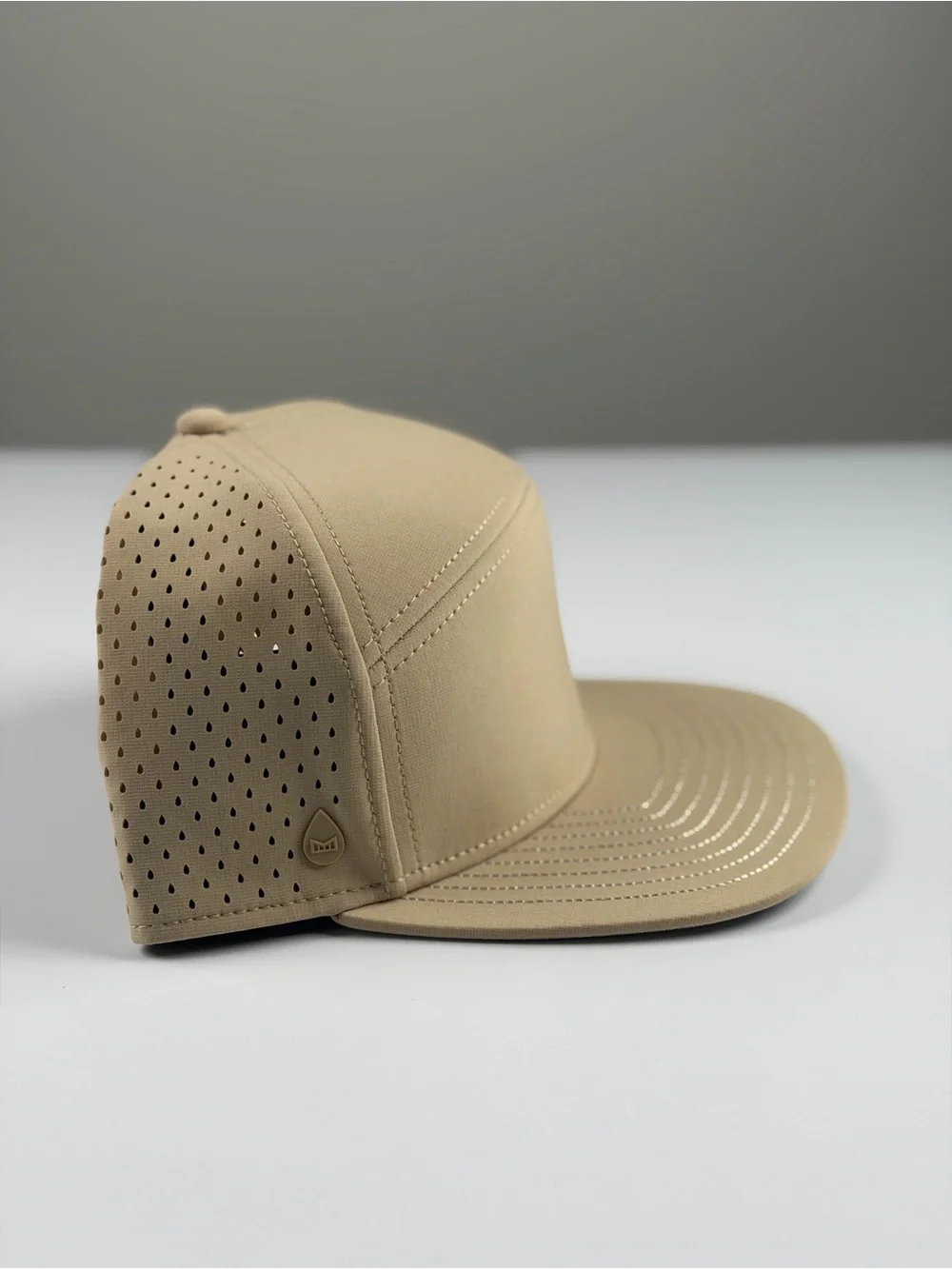 Melin Trenches Icon Hydro Performance Snapback Hat in Khaki, Classic