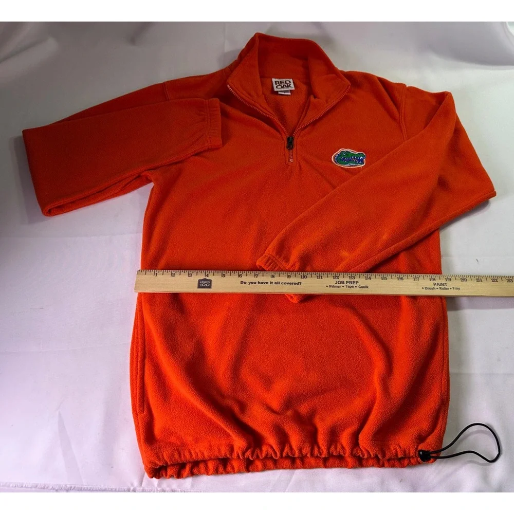 Red Oak Sportswear enjoying stands chest