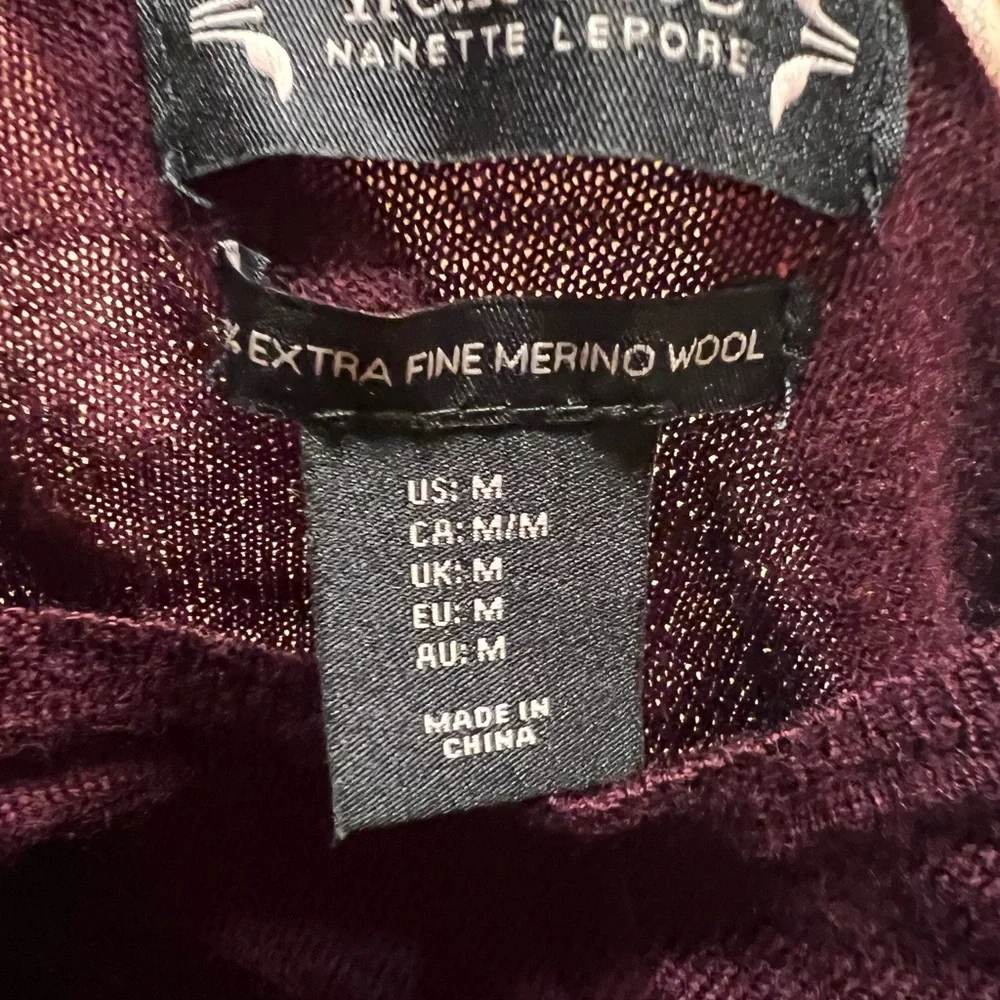 Nanette Lepore sweater    •   long jeans