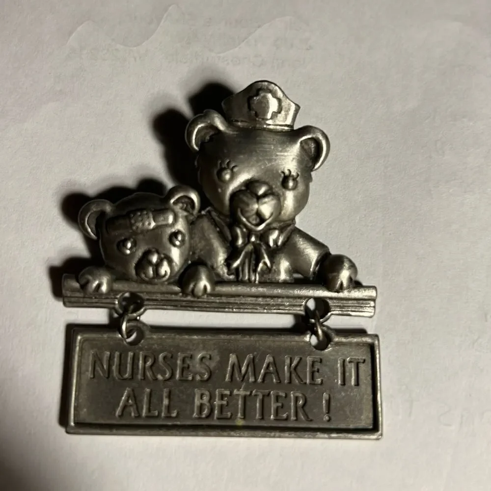 Vintage JJ pin Brooch pewter nurse & bear.