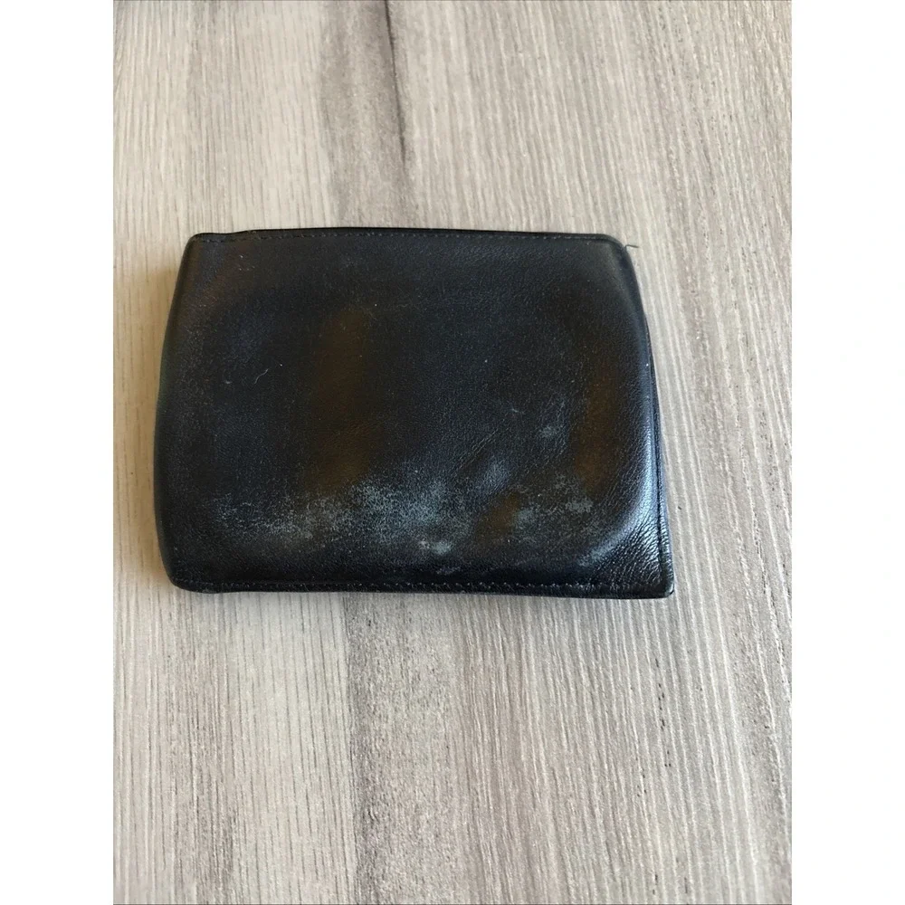Tumi black leather