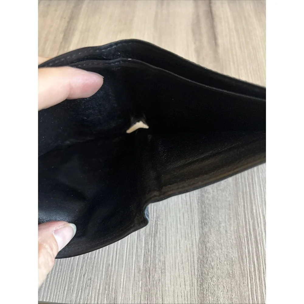 Tumi black leather