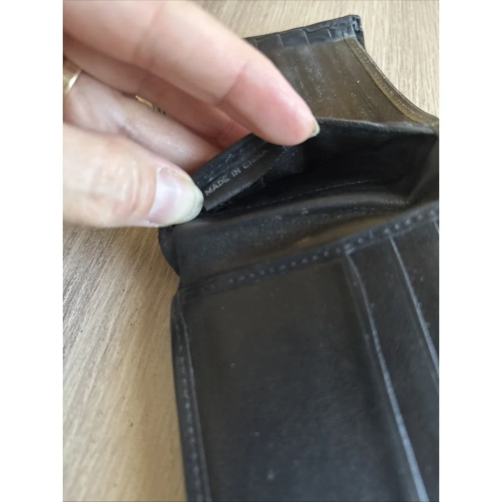 Tumi black leather
