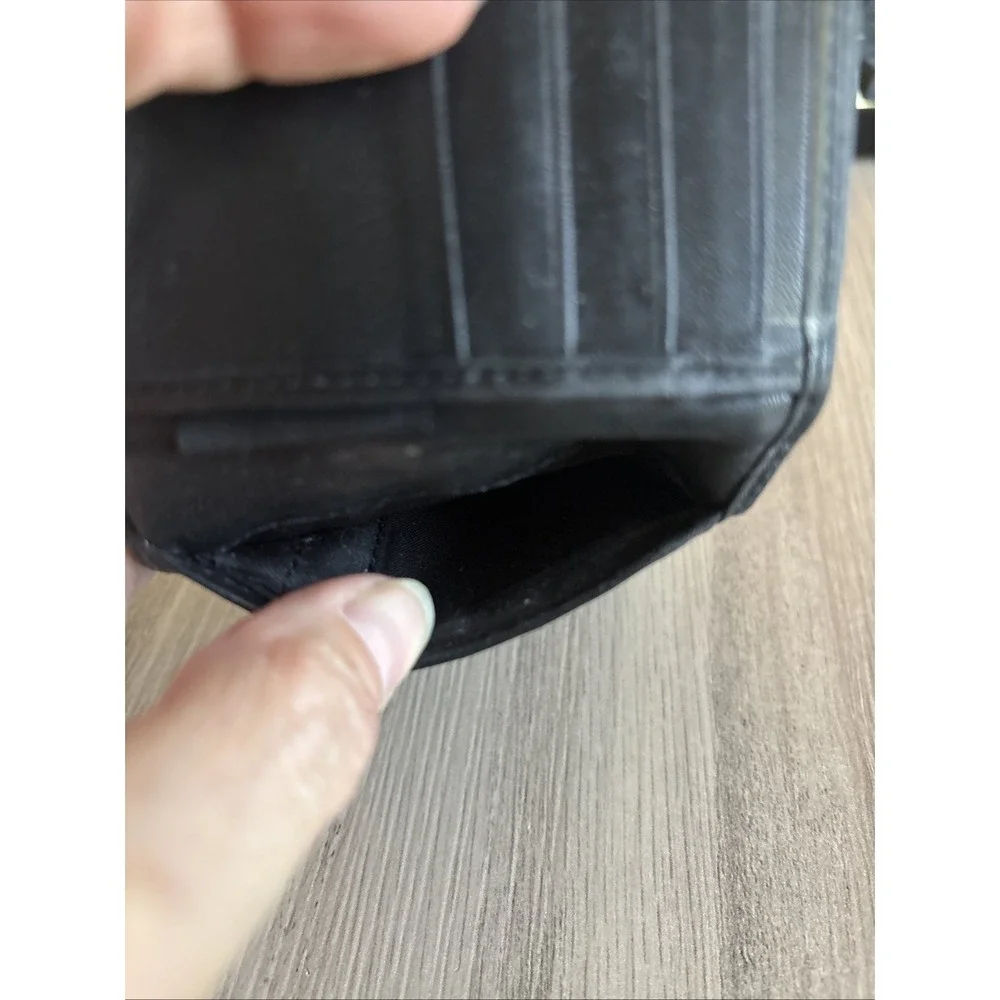 Tumi black leather