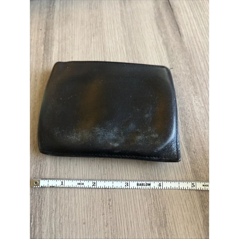 Tumi black leather