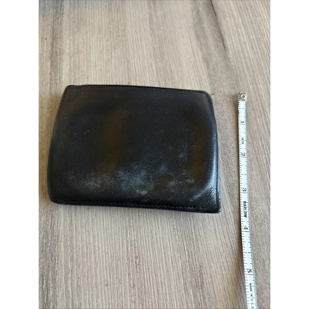 Tumi black leather