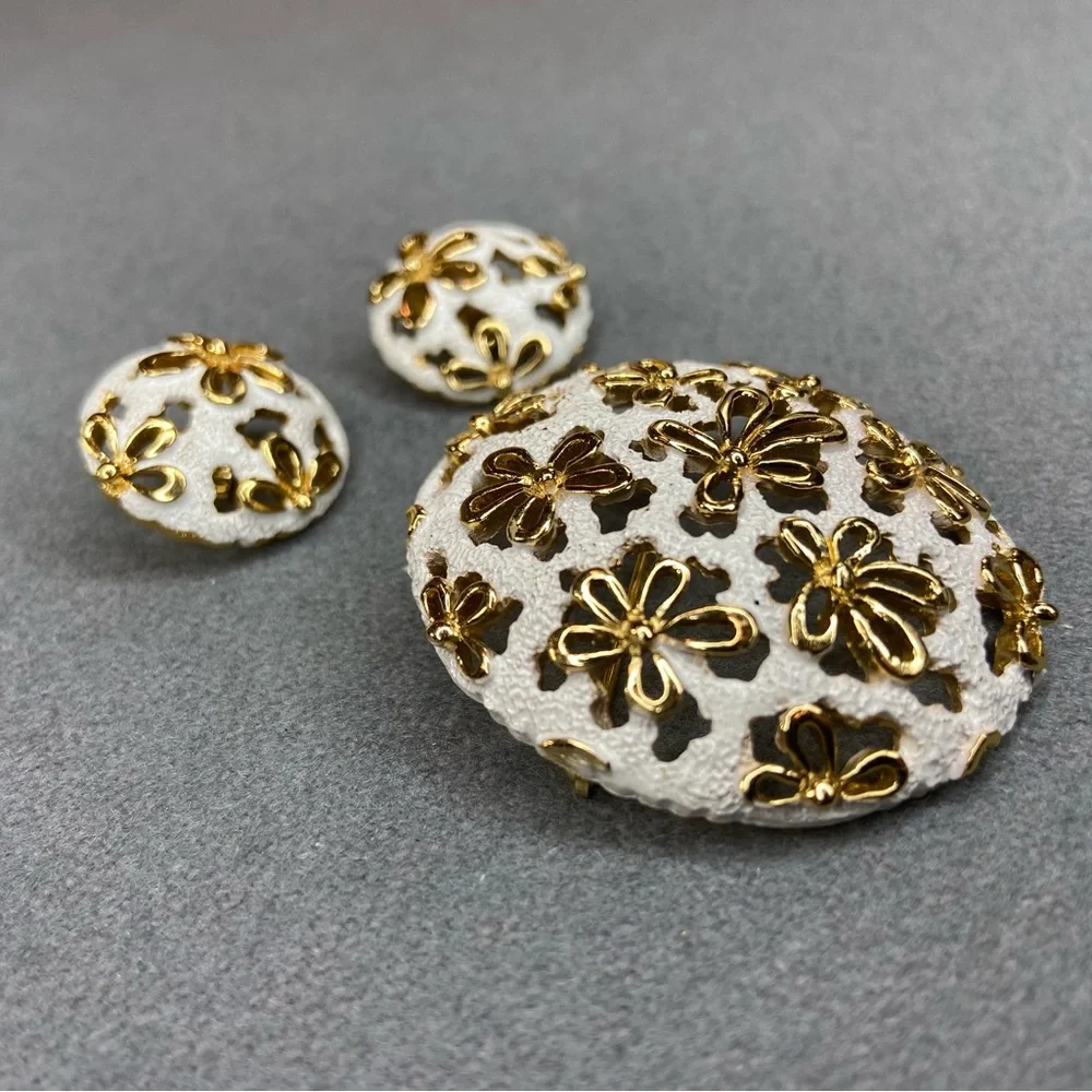 Trifari have enamel