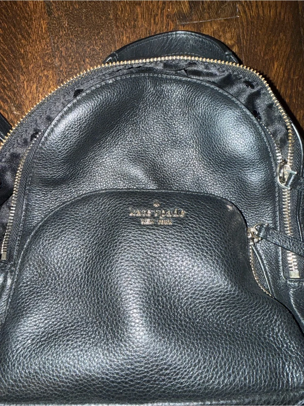 kate spade black pebbled leather mini backpack with gold logo