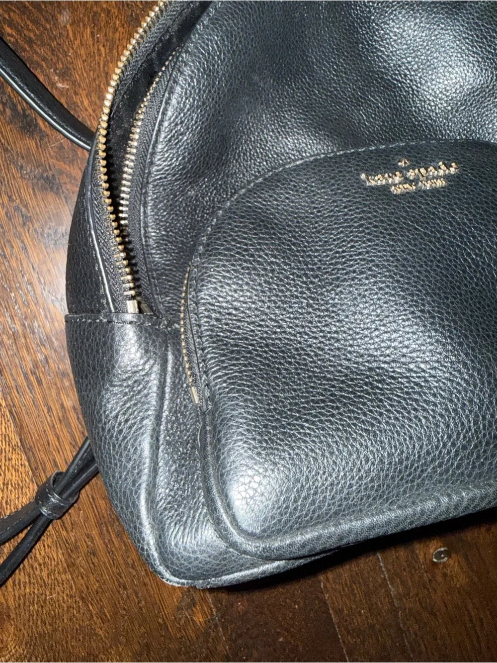 kate spade black pebbled leather mini backpack with gold logo