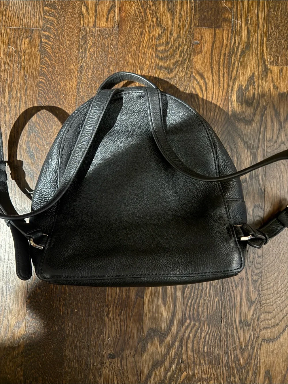 kate spade black pebbled leather mini backpack with gold logo