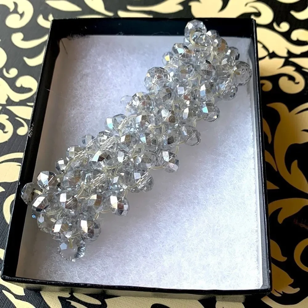 Clear, silver and iridescent beaded bracelet