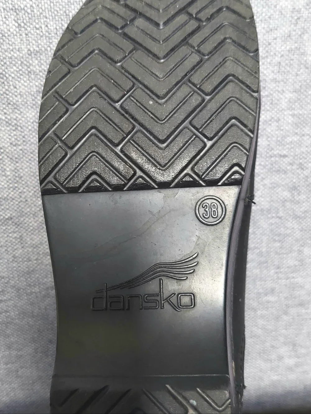 Dansko while providing heel