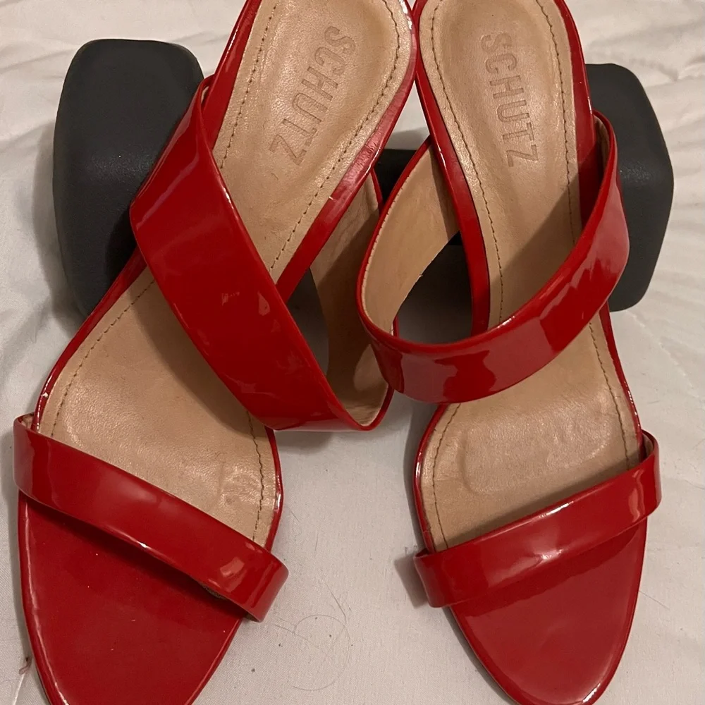 SCHUTZ sleek red