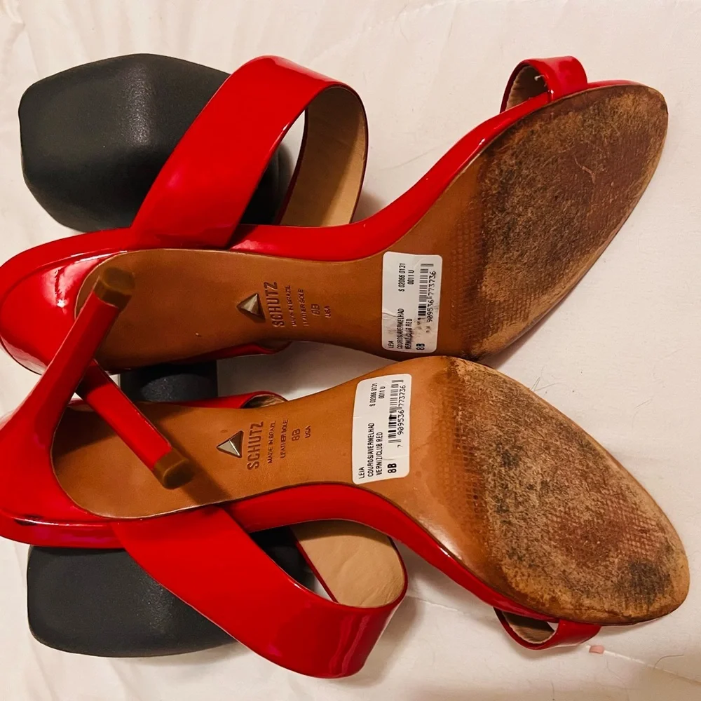 SCHUTZ sleek red