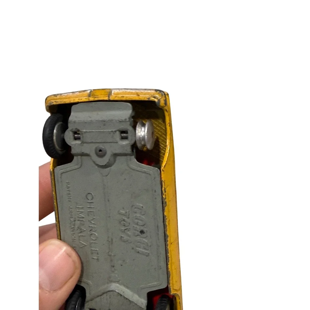 VTG Corgi Toys Chevrolet Impala Taxi Cab Yellow Diecast Car Made in GT Britain