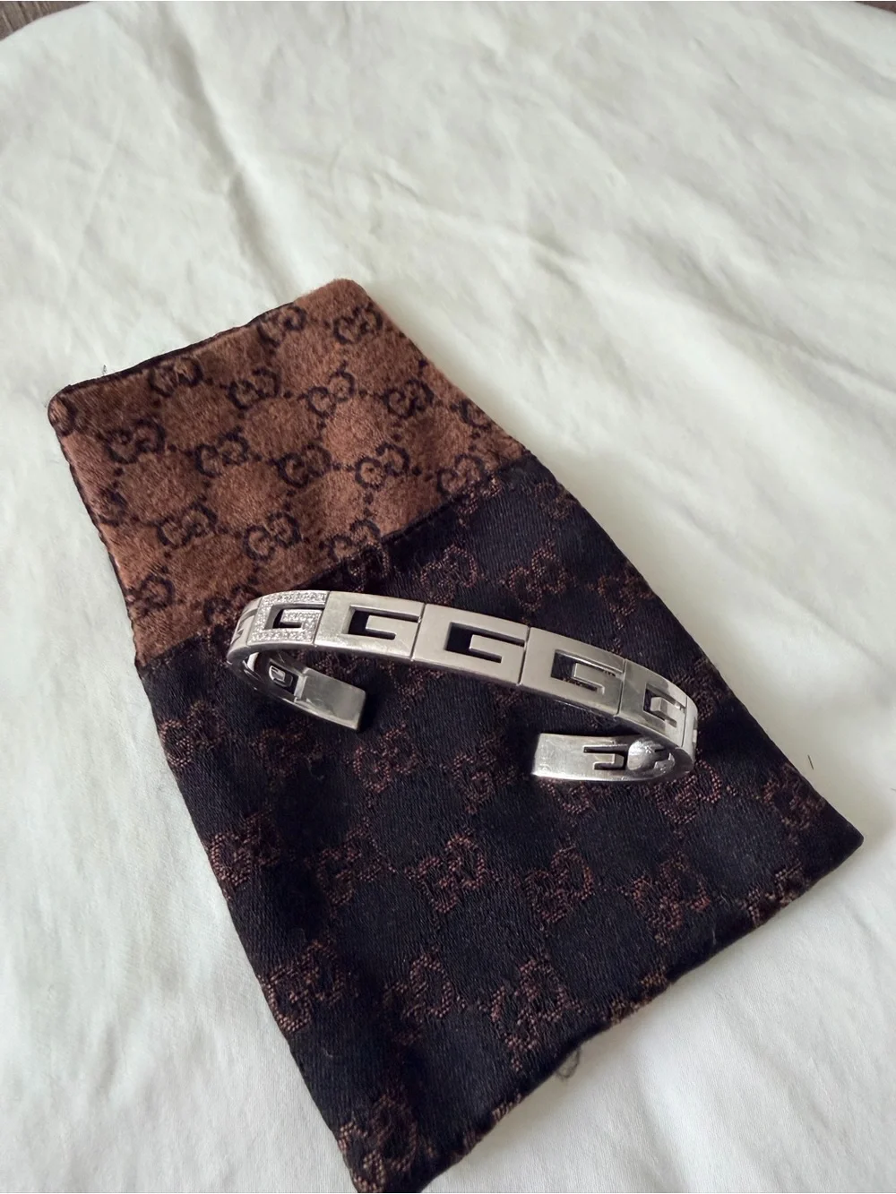 GUCCI White Gold/Diamond “G” logo bracelet