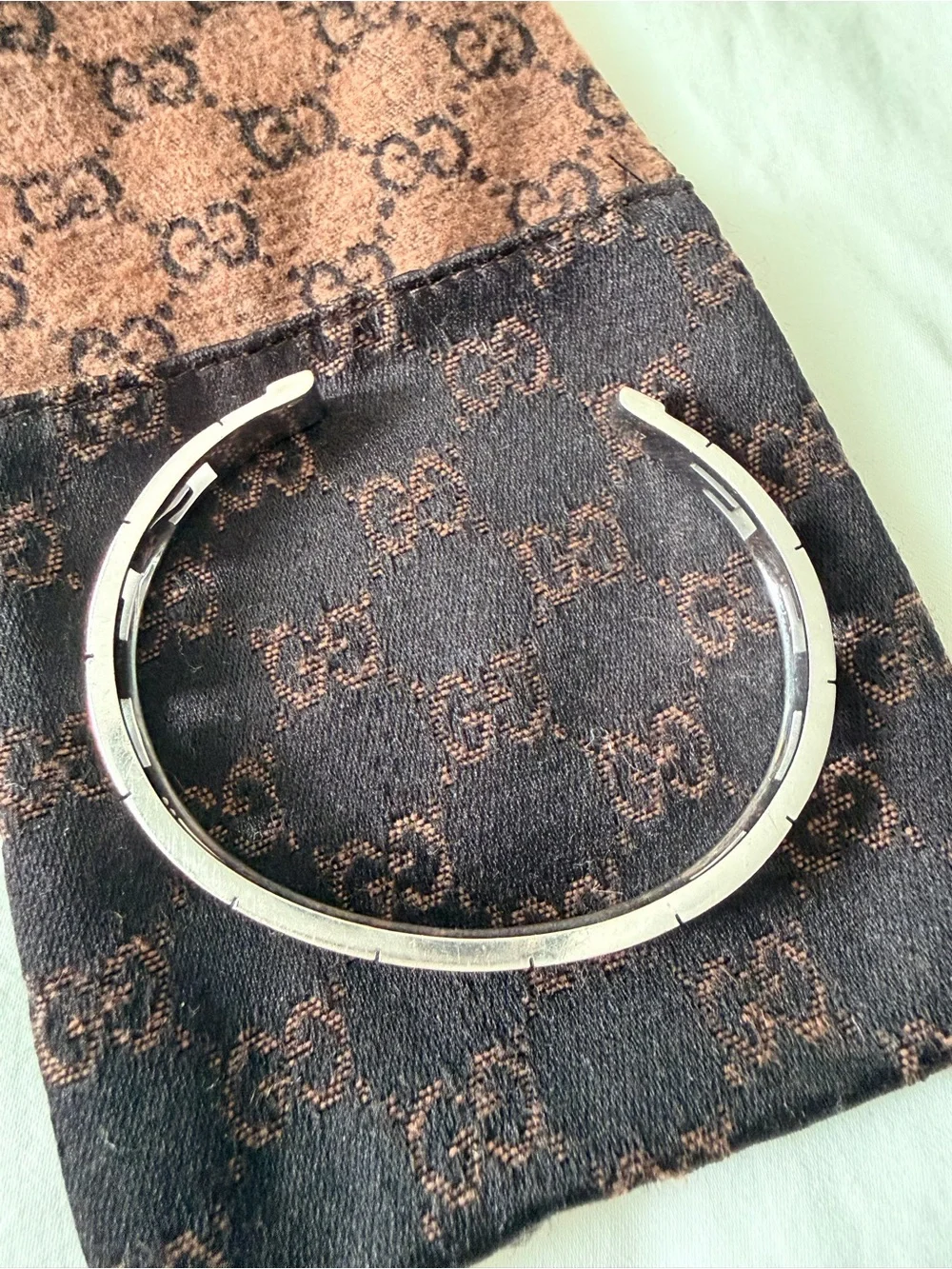 GUCCI White Gold/Diamond “G” logo bracelet
