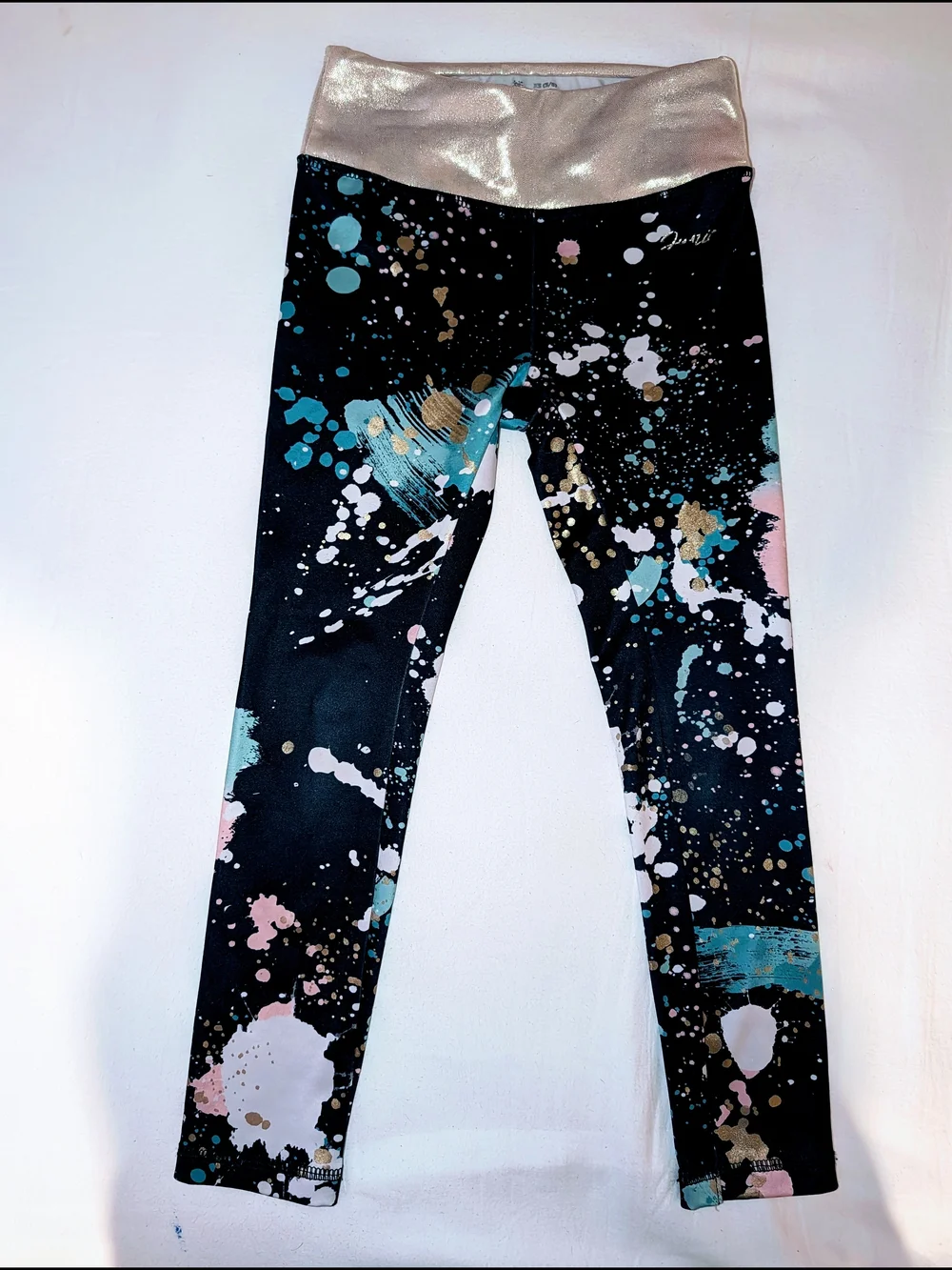 Justice Black Leggings with Metallic Gold Waist and Multicolor Paint-Splash