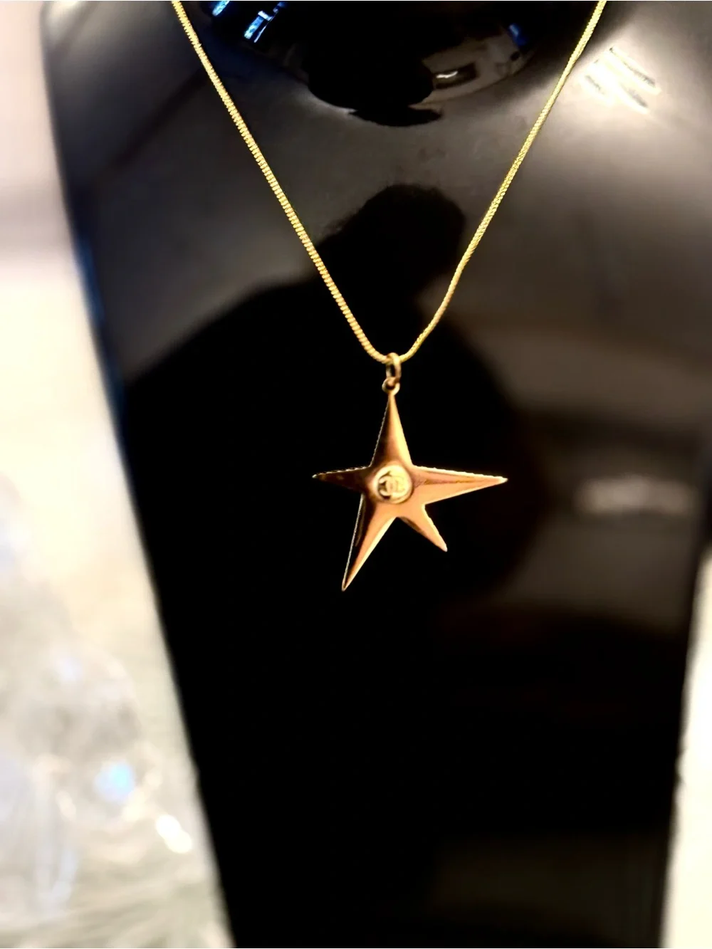 CHANEL gold tone