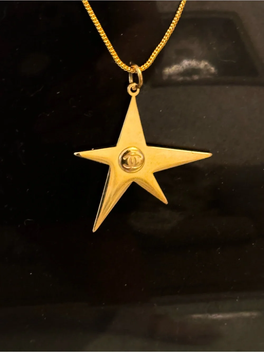 CHANEL gold tone