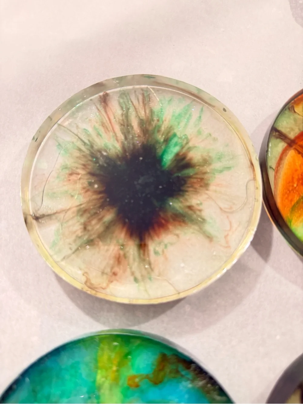Handmade Resin Coaster with Swirl of Orange, Green and Red