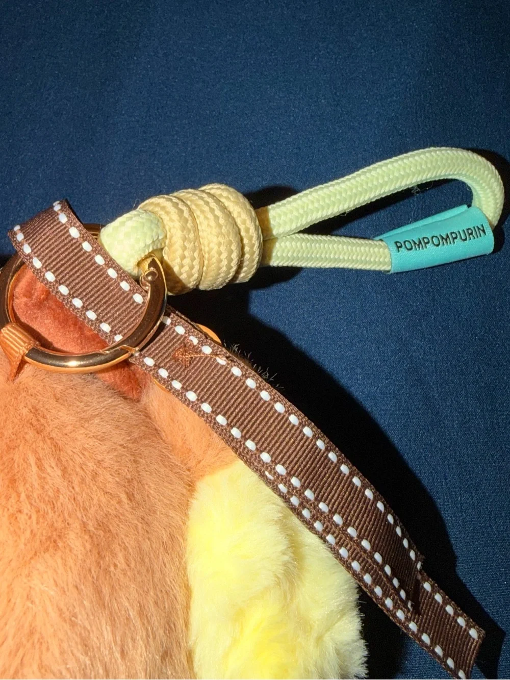 MINISO - Capybara Pompompurin Plush Keychain