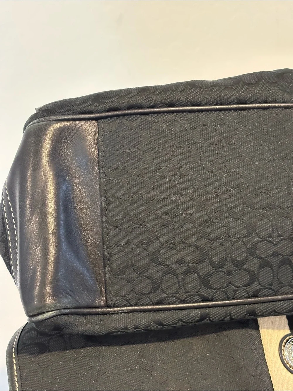 Coach sleek black