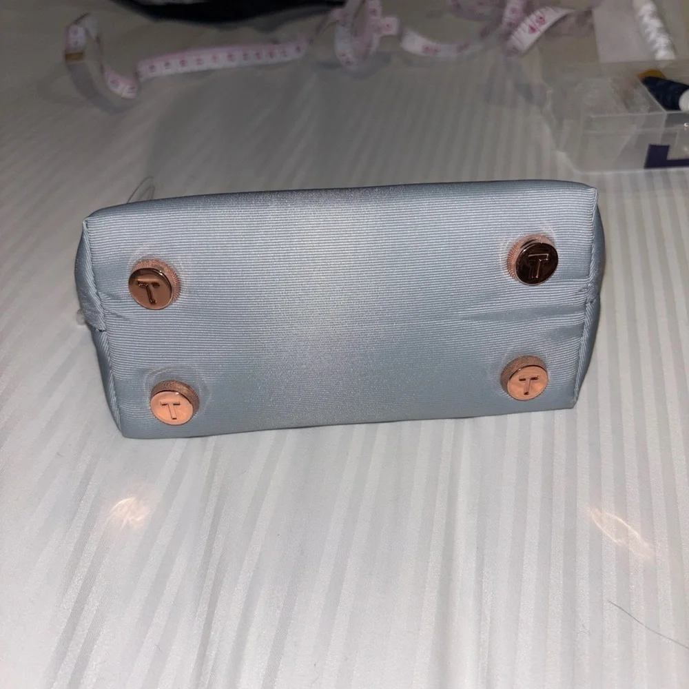 Ted Baker London steel wites light