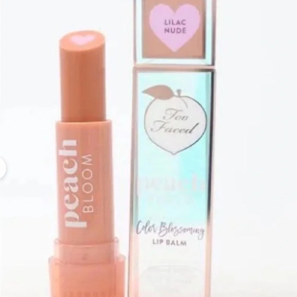 Too Faced Peach Bloom Color Blossomny Lip Balm - color is Lilac Bloom