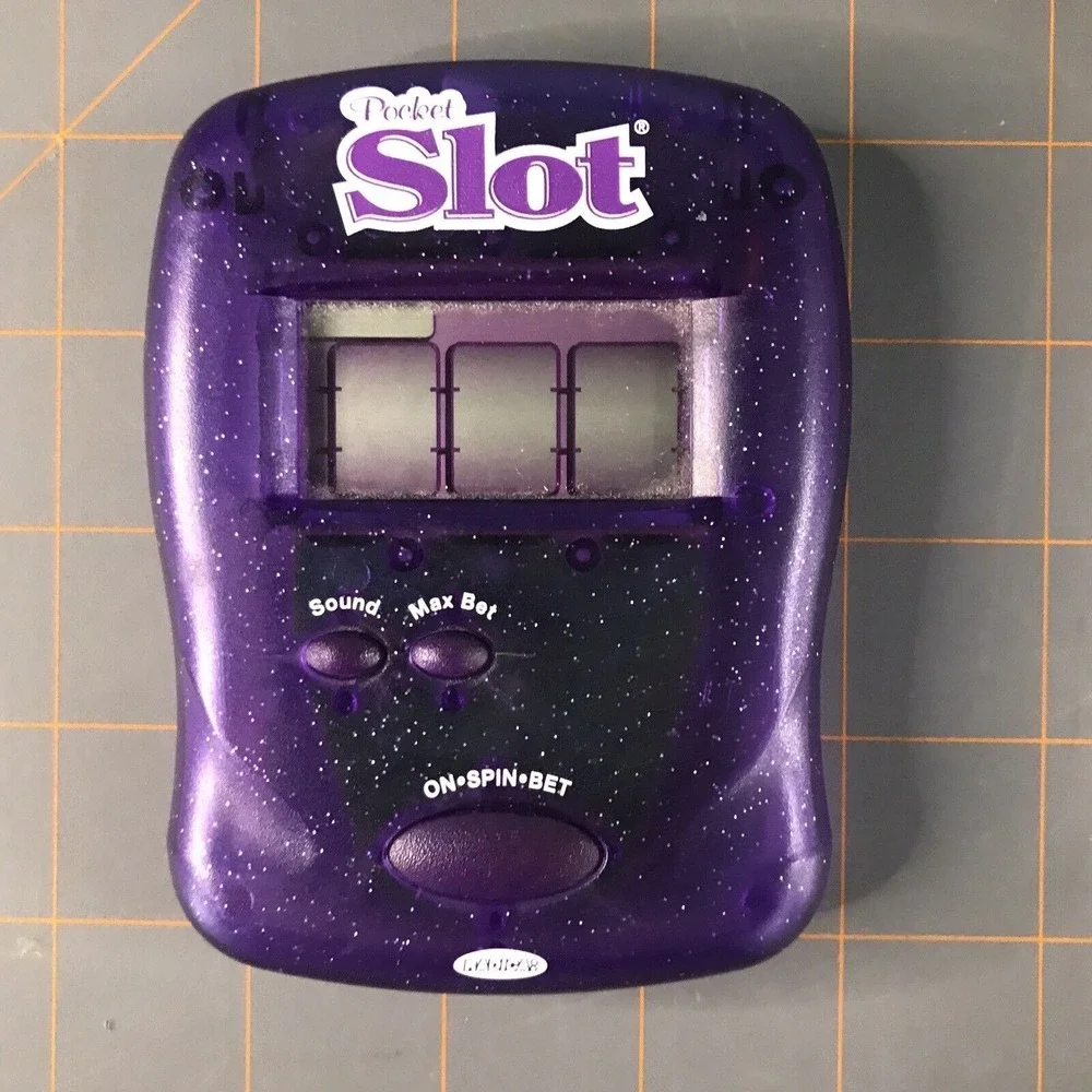 Radica 2004 Purple Pocket Electronic Handheld Game‎ Machine Game