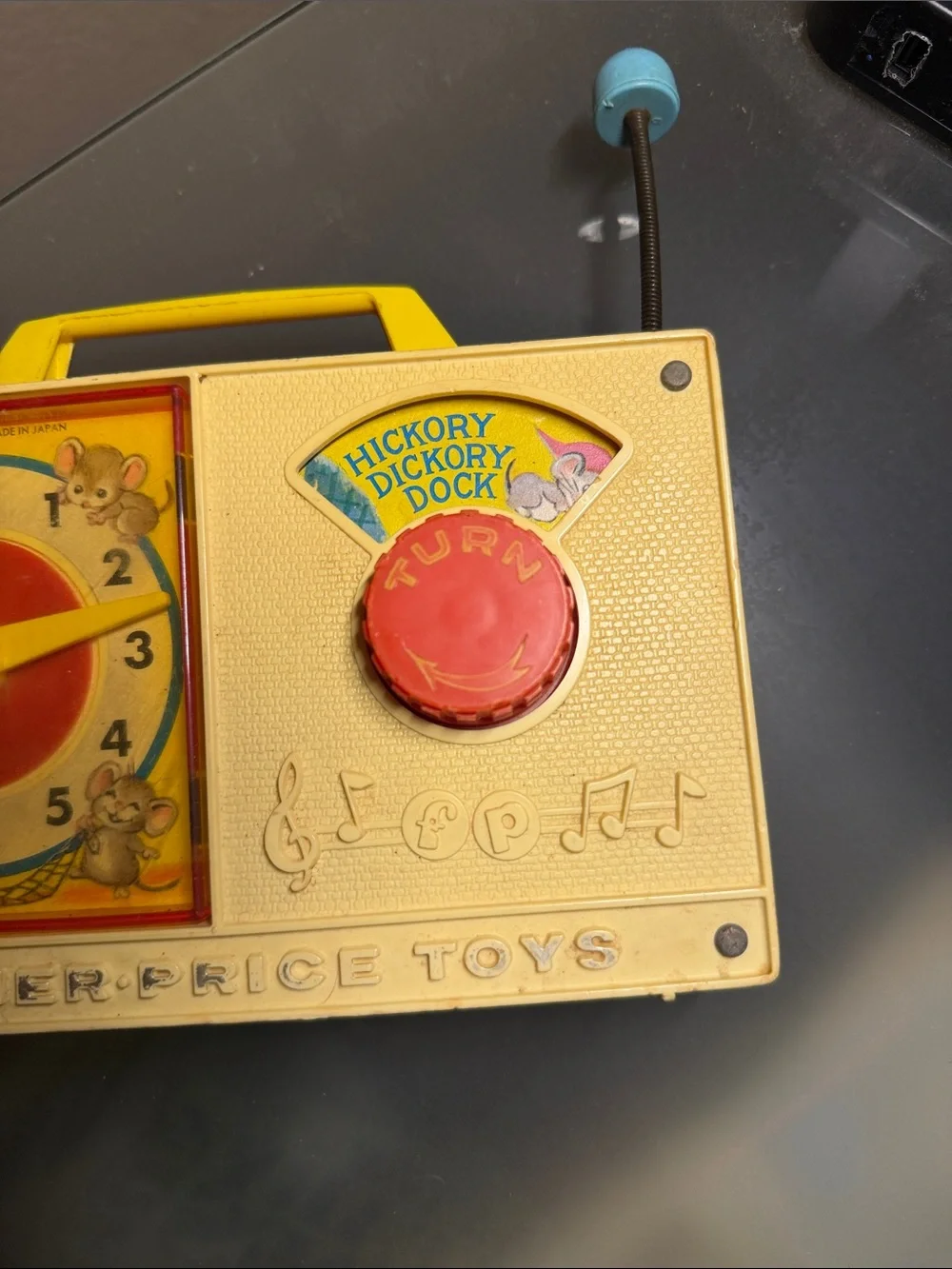 Vintage 1960-1970 Fisher-Price Yellow Musical Clock Toy with Red Dial